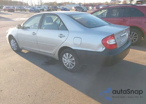 2002 Toyota Camry Le z USA, uszkodzony, nr VIN 4T1BE32K02U521608